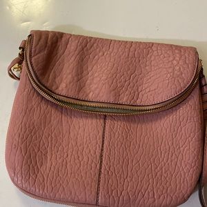 Vince Camino purse with strap. One side of the bag cannot attach strap.